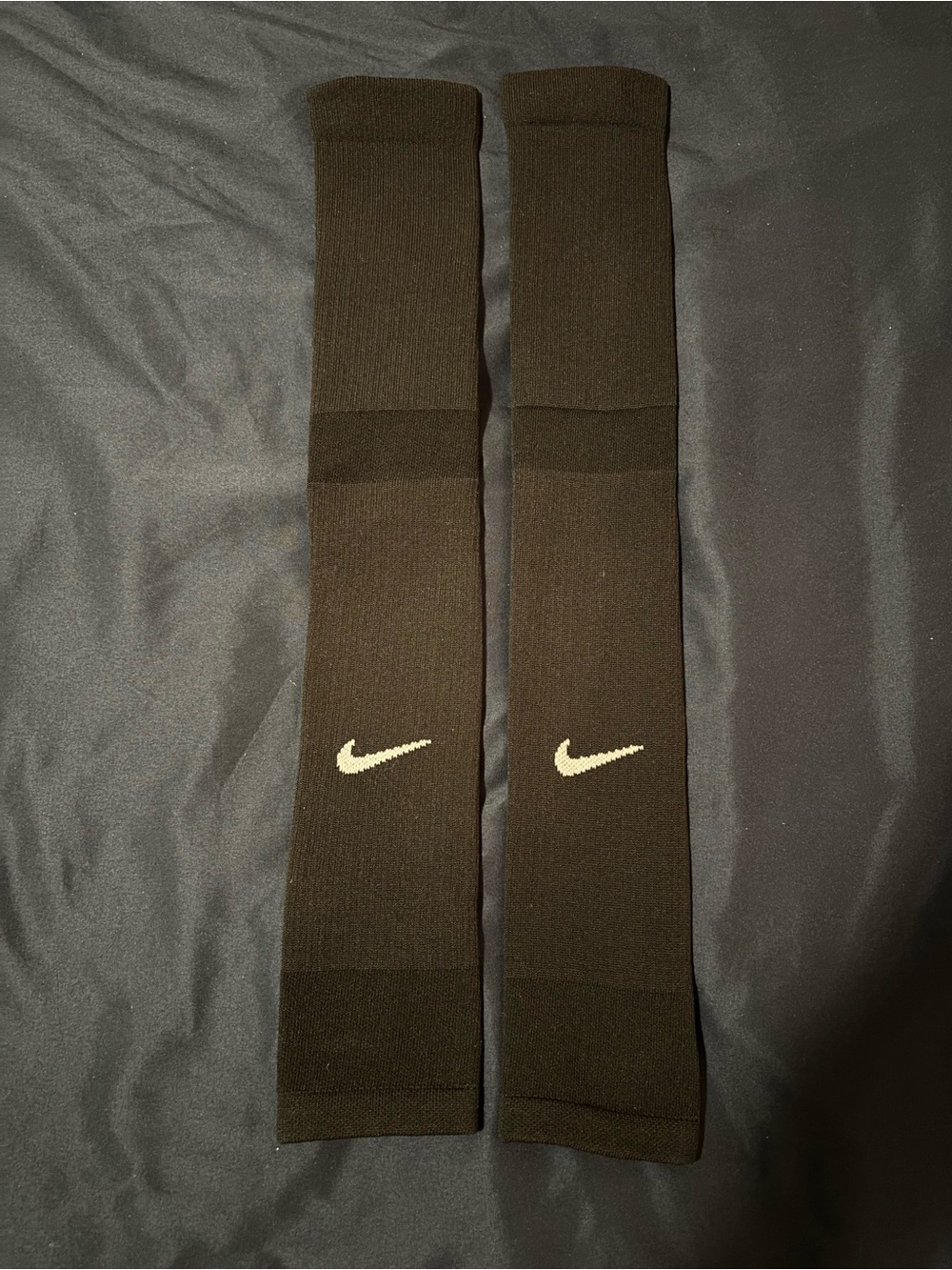 Nike Black Knee-High Athletic Socks with White Swoosh Logo